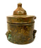 Historical Khorassan bronze writing accessory featuring a fitted domed lid, pronounced circular mouldings, and traditional Islamic metalworking details.