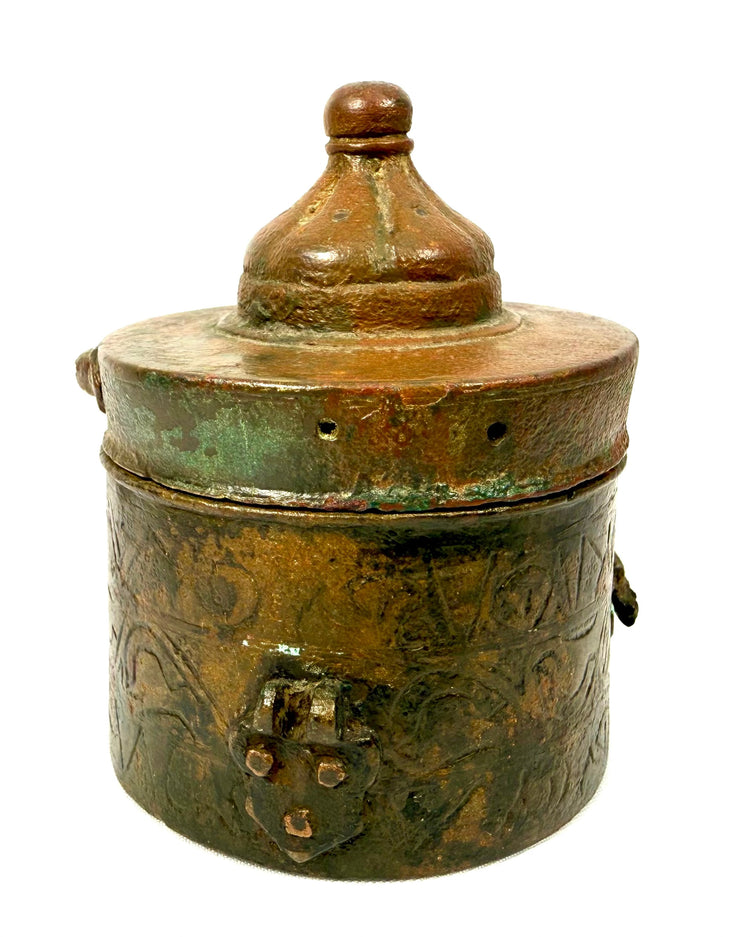 Medieval Islamic Khorassan bronze inkwell with a cylindrical body, conical domed lid, and rounded finial, attributed to the 10th–12th century CE.