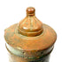 Islamic bronze inkwell with preserved metal attachment elements, small lid perforations, and partially worn geometric engravings.