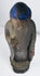 Close elevated view of the Amida Buddha’s blue hair, ushnisha, and worn gilding