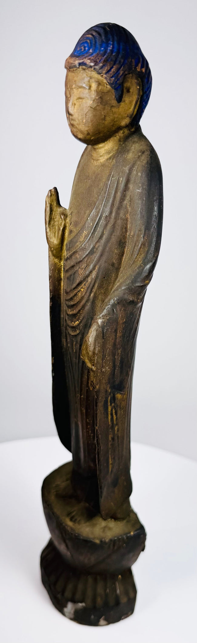 Profile view of the Japanese Amitabha Buddha with surviving gilded decoration