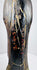 Reverse of the Japanese Amida Nyorai statue showing a red-and-gold inscription