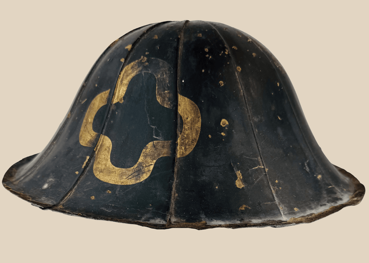 Antique Edo period Japanese jingasa samurai helmet with black lacquer and gilt mon crest