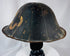 Antique Japanese lacquered helmet with segmented dome and surviving interior red lacquer