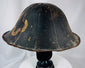 Antique Japanese lacquered helmet with segmented dome and surviving interior red lacquer