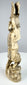 Rear view showing incised garments and sectional construction of the Japanese okimono