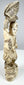 Opposite side view of the Meiji-period falconer okimono on a rocky base