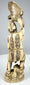 Japanese falconer carving with geometric clothing patterns and seigaiha head covering