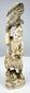 Front view of a Japanese sectional okimono depicting a falconer and raptor