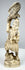 Three-quarter view of an antique Japanese falconer sculpture with spread-wing bird