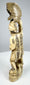 Detailed view of the carved eagle or hawk with deeply incised wing feathers