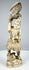 Meiji-era Japanese carved falconer holding an eagle or hawk overhead