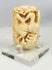 Delicate openwork Japanese bone carving with birds in botanical surround, antique Meiji period piece