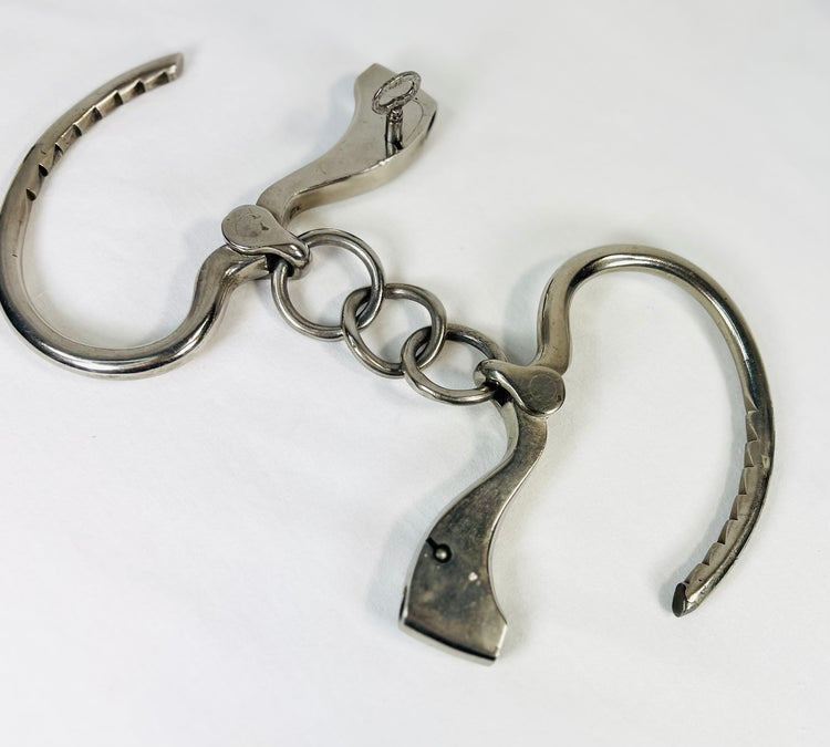 Esposas ajustables con llave John J. Tower | Estados Unidos | Década de 1866-1940