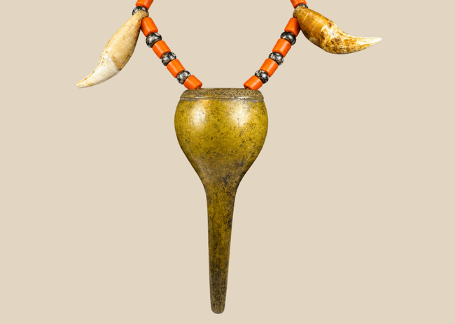 Antique Konyak Naga warrior prestige necklace with brass pendant, glass trade beads and animal teeth