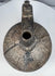 Pre-Columbian Peruvian blackware bottle associated with the Sicán culture of the Lambayeque Valley.