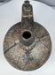 Pre-Columbian Peruvian blackware bottle associated with the Sicán culture of the Lambayeque Valley.