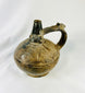Small Sicán blackware ceramic bottle from Lambayeque Valley, Peru, 5.5 x 6 inches, burnished surface with elegant form, ritual and ceremonial artifact from 750–1375 A.D.