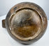 Ancient Lambayeque ceramic vessel with polished black surface and compact sculptural form from coastal Peru.