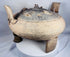 Close-up of the pierced domed lid featuring applied miniature animal figures from an ancient Chinese ritual vessel.