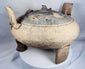 Close-up of the pierced domed lid featuring applied miniature animal figures from an ancient Chinese ritual vessel.