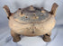 Authentic ancient Chinese terracotta ritual vessel with a removable pierced lid and tripod feet.