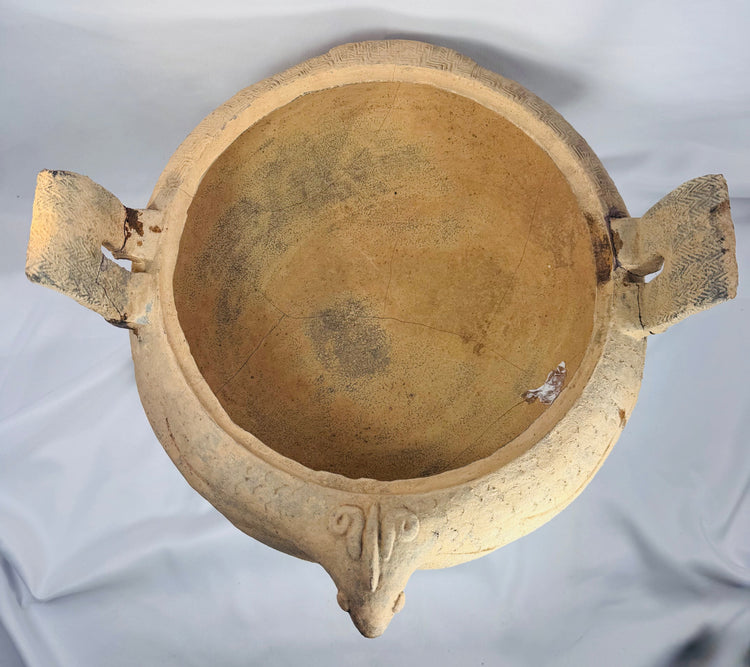 Large Eastern Zhou to Han Dynasty terracotta ritual vessel with sculptural zoomorphic form and archaeological patina.