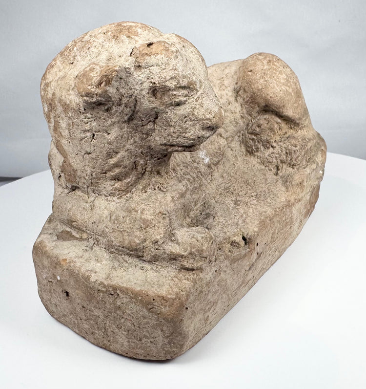 Ancient Egyptian lion sculpture in terracotta with hollow construction and integral base
