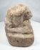 Egyptian terracotta lion votive sculpture with muscular body and stylized mane