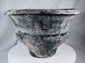 Ban Chiang-style ceramic pot with broad rim, crosshatched texture, and aged surface treatment