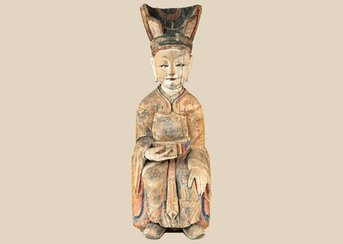 Chinese carved wooden sculpture of a seated court official with original polychrome decoration.