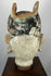 Chinese carved terracotta bust representing a scholar-official from the Qing period.