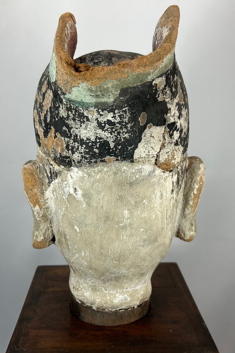 Chinese carved terracotta bust representing a scholar-official from the Qing period.