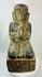 Burmese Buddhist kneeling attendant sculpture with hands pressed together in prayer.