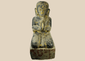 Burmese carved wood sculpture of a kneeling Buddhist devotee with hands in prayer, Mandalay period.