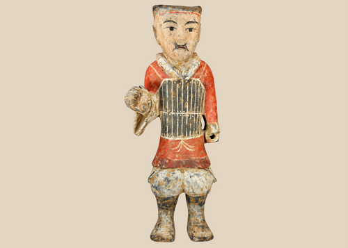 Han Dynasty terracotta soldier figure with original painted details and burial patina