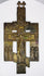 Antique bronze Orthodox cross from Russia displaying detailed religious imagery and devotional craftsmanship.