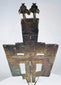 Russian bronze devotional cross depicting Christ on the cross surrounded by saints and sacred inscriptions.