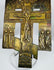 Imperial Russian bronze devotional cross displaying Christ crucified, saints, and traditional Orthodox iconography.