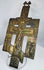 Historic Russian devotional cross featuring a central crucifixion panel and ornate religious imagery.