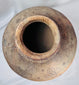 Traditional Indonesian island pottery jar with painted shoulder decoration and natural firing variations