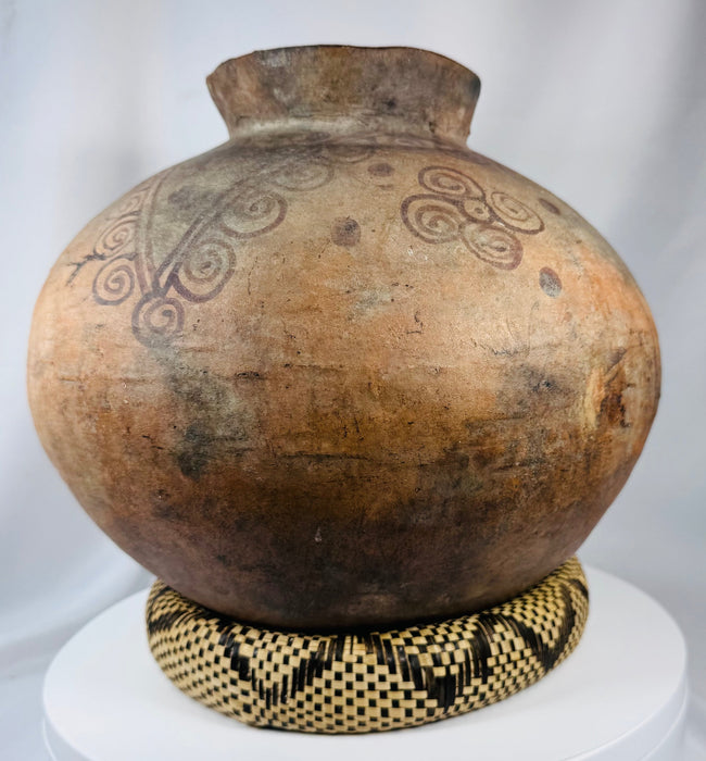 Ethnographic Timorese pottery vessel with globular body and traditional painted geometric motifs