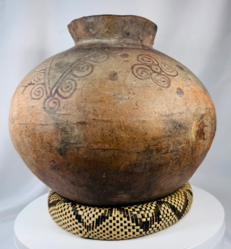 Ethnographic Timorese pottery vessel with globular body and traditional painted geometric motifs