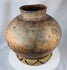 Large ethnographic pottery vessel from Timor-Leste with spiral ornamentation and aged earthenware finish