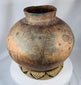 Large ethnographic pottery vessel from Timor-Leste with spiral ornamentation and aged earthenware finish