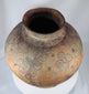 Traditional Timor Island earthenware vessel mounted on a woven display ring with authentic aged character