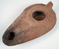 Ancient mould-made oil lamp with concentric bands and radiating shoulder grooves
