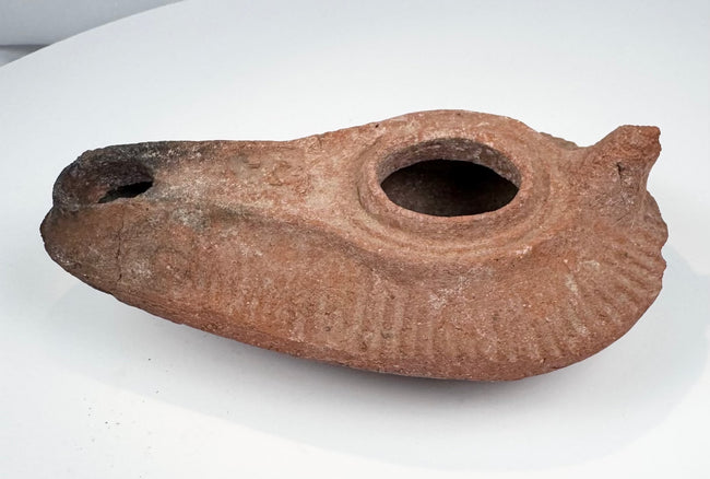 Byzantine to Early Islamic pottery oil lamp with partial rear handle