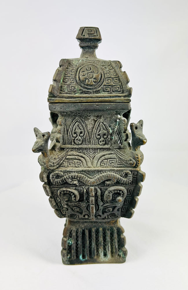 Late Qing archaistic bronze fang yi ritual vessel with taotie masks, leiwen ground, and roof-form lid, China circa 1880–1930.