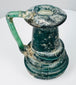 Late Roman glass vessel with thick raised trail decoration encircling the lower body